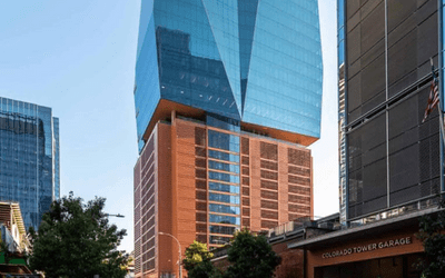 This Pedestal-like Parking holds up a Gleaming Glass Office Tower | 405 Colorado